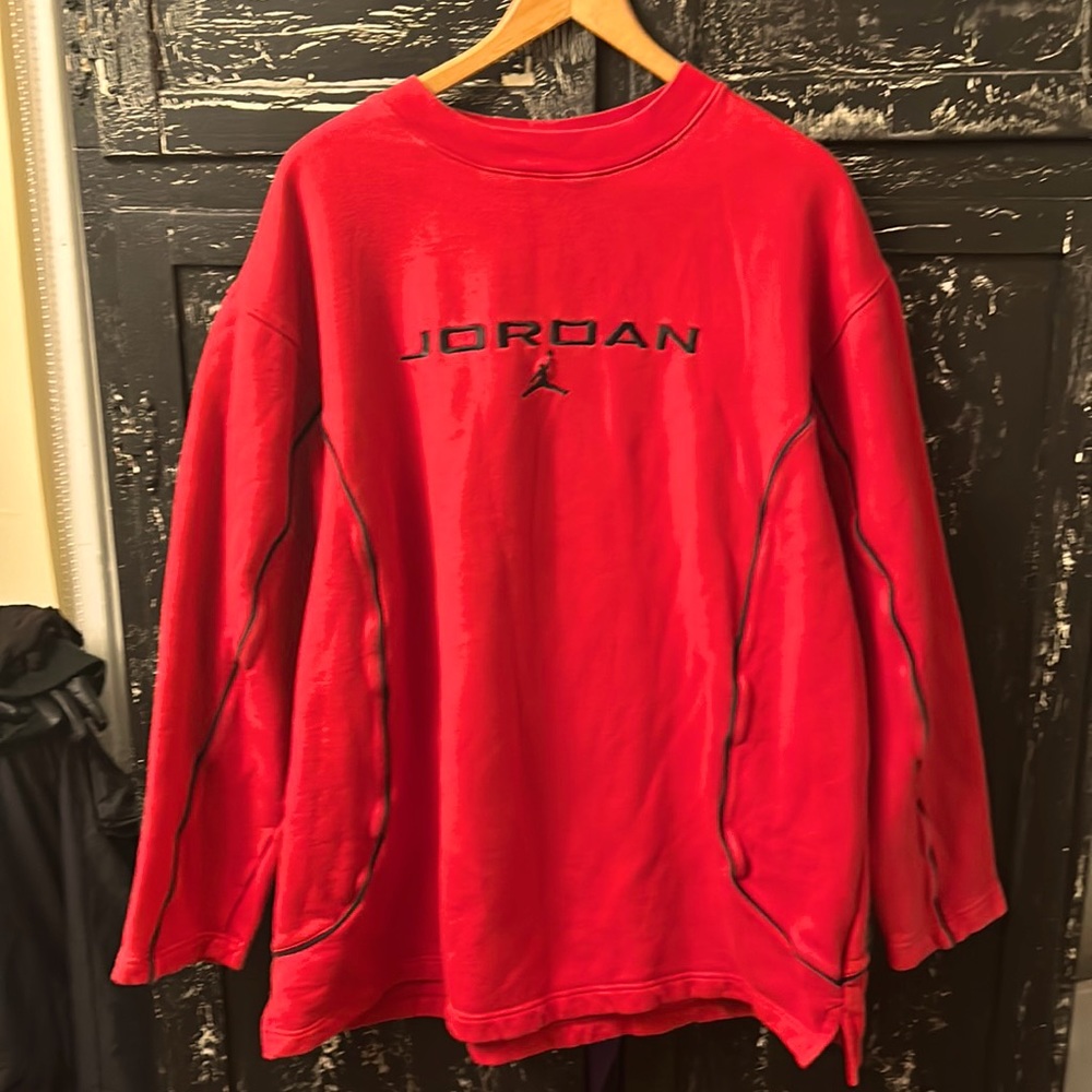 Two for one red, long sleeve, Jordan sweatshirt and a blue short sleeve hoodie.